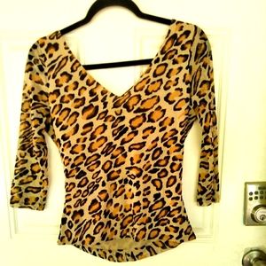 Animal print blouse.
